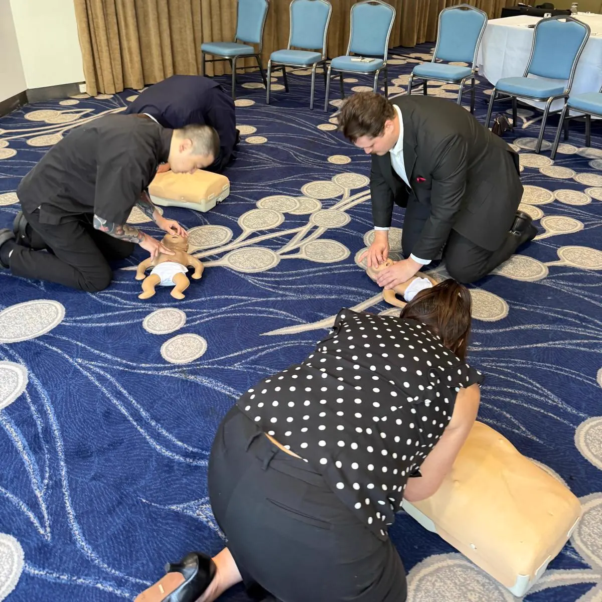 Workplace first aid training session with practical equipment on the Gold Coast